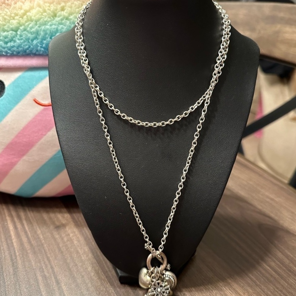 Elegant Silver Necklace with Charms